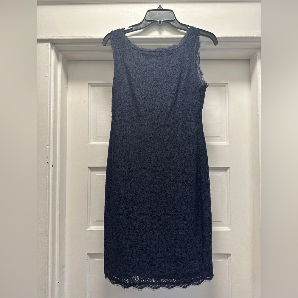 Adrianna Papell Size 6 Navy Blue Dress with lace shell and back zipper.